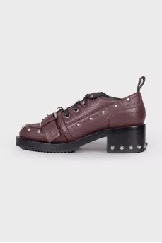 Leather shoes with metal rhinestones