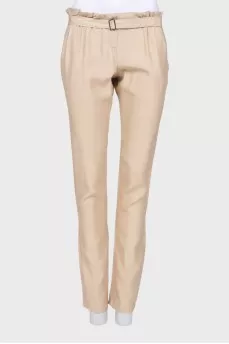 Beige trousers with belt