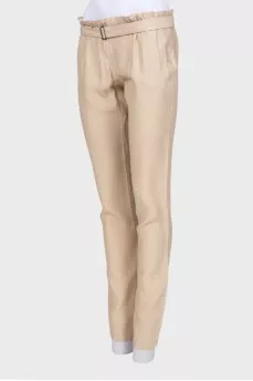 Beige trousers with belt