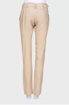Beige trousers with belt