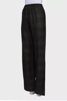 Wool trousers with press-studs on the sides