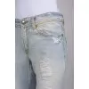 Light blue distressed jeans