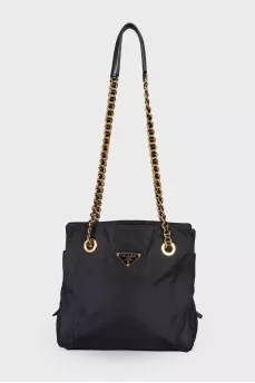 Textile bag with triangular logo