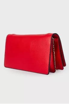 Leather clutch with detachable strap
