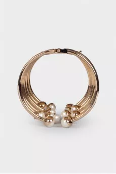 Golden bracelet with pearls