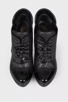 Leather ankle boots with patent inserts