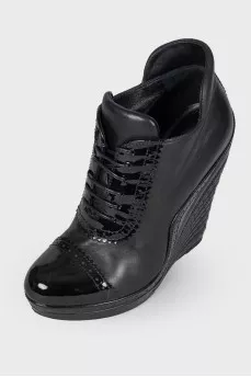 Leather ankle boots with patent inserts
