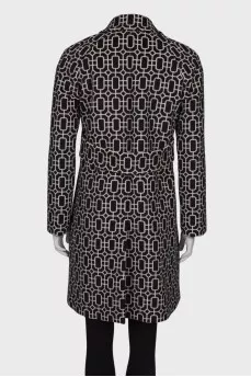 Coat in geometric black and white print