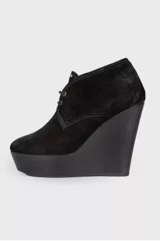 Black high wedge ankle boots