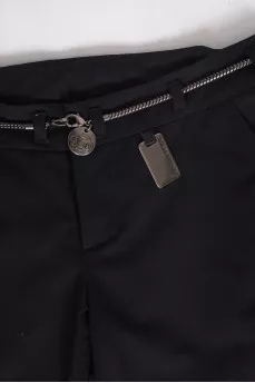 Black trousers with metal belt