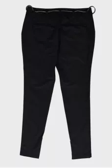Black trousers with metal belt