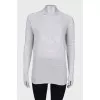 Sweater with open back and rhinestones