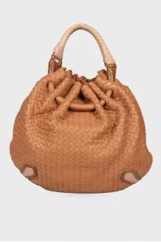 Woven semi-circular bag