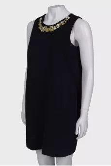 Black dress with rhinestones on the chest