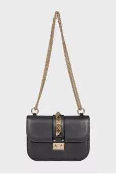Кожаная сумка с шипами