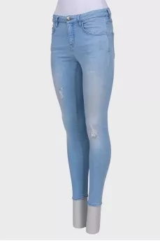 Light blue ripped effect jeans
