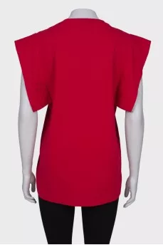 Knitted red T-shirt, with a tag
