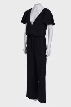 Black jumpsuit with slits on the shoulders