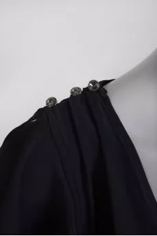 Black jumpsuit with slits on the shoulders