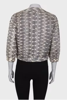 Windbreaker with snakeskin effect