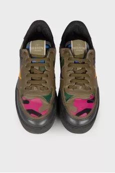 Dark green studded sneakers