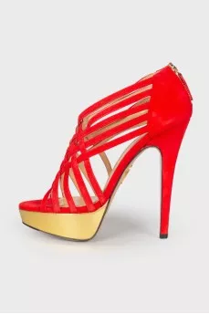 Sandals with golden soles