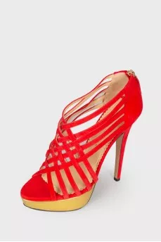 Sandals with golden soles