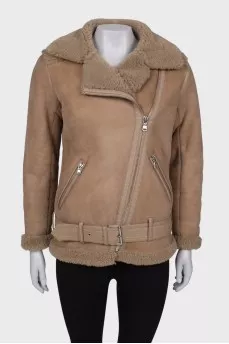 Beige sheepskin coat on the belt