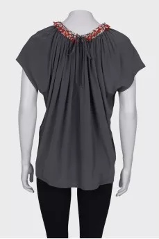 Dark green blouse with rhinestones