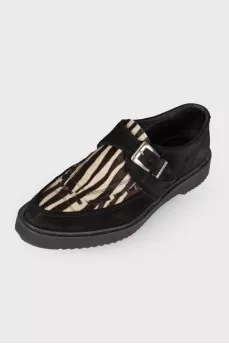 Black loafers with pony skin