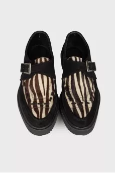 Black loafers with pony skin