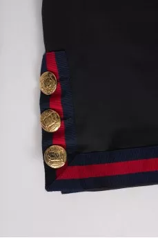 Black skirt with golden buttons