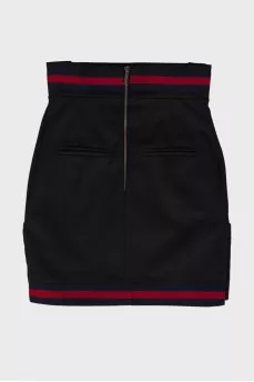 Black skirt with golden buttons