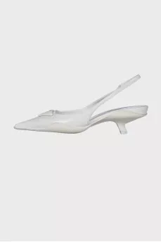 White slingbacks with brand logo