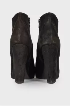Black suede heeled ankle boots
