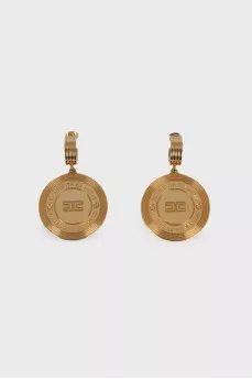 Golden earrings with brand logo