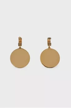 Golden earrings with brand logo