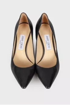 Black leather pumps