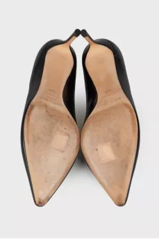 Black leather pumps