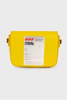 Yellow bag with textile strap
