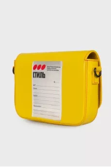 Yellow bag with textile strap
