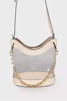 Transparent bag with golden hardware