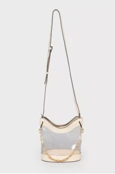 Transparent bag with golden hardware