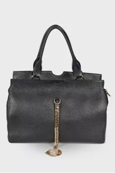 Leather bag with golden keyring