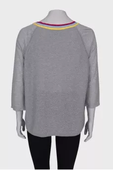 Gray pullover with floral patch