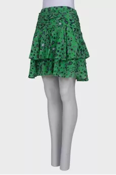 Green skirt with ruffles in print