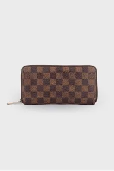Brown wallet in signature print