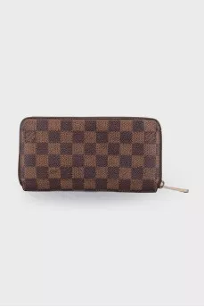 Brown wallet in signature print