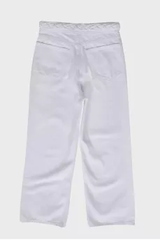 White jeans with a decorative belt