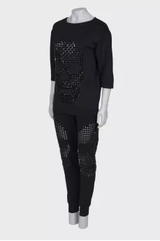 Suit with rhinestones in the shape of a skull